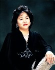 菅 英三子